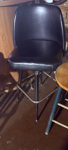 Black vinyl swivel bar stool