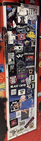 Sticker-bombed full-length mirror